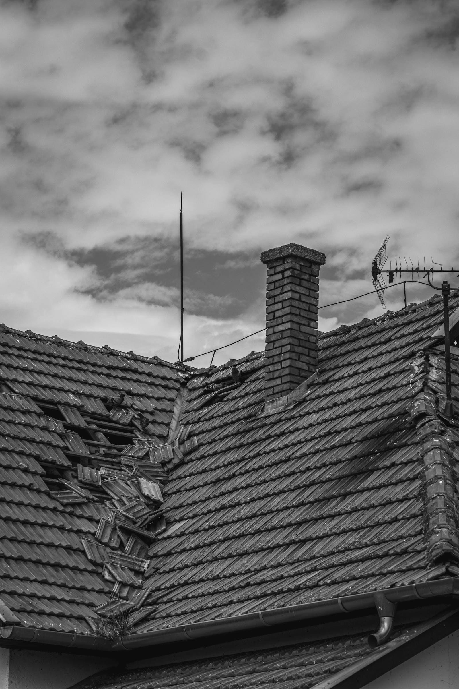 Hurricane storm damage on a residential roof